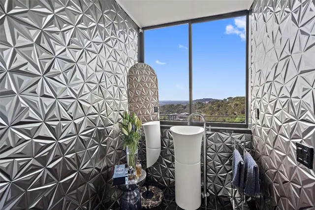 a view of a chairs and table in a patio