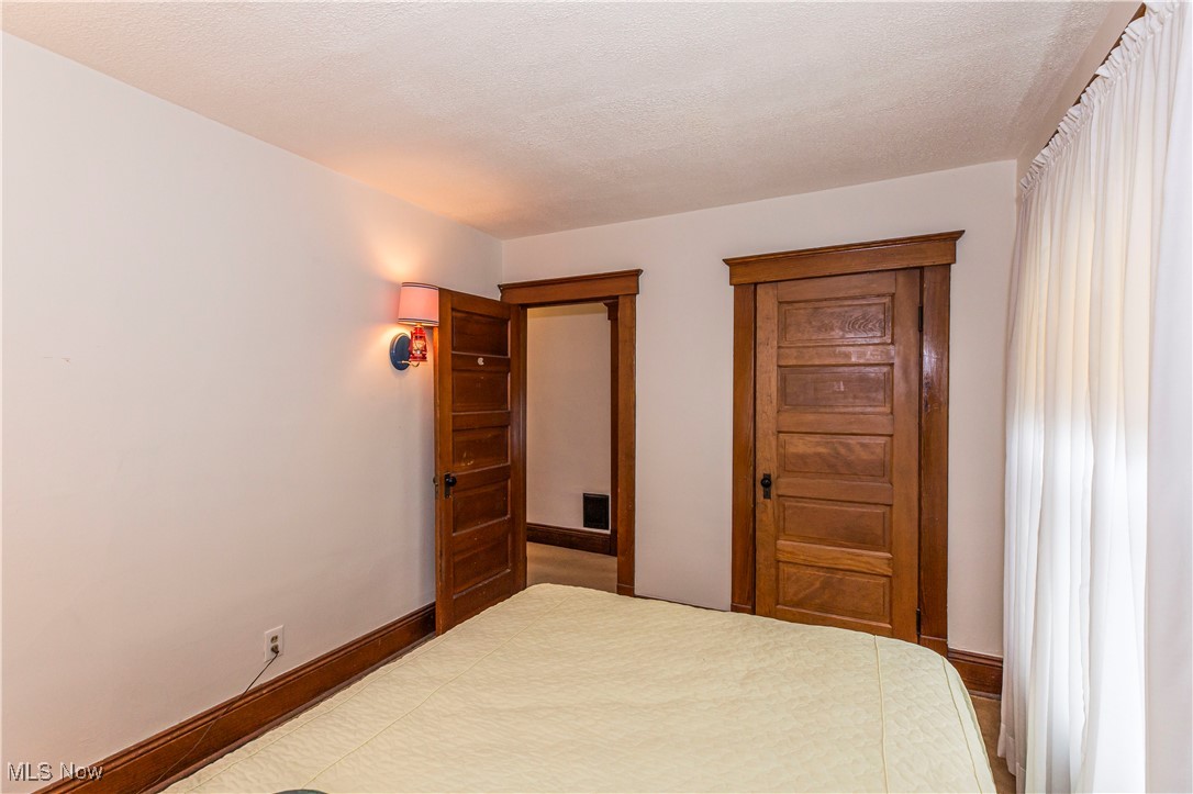 749 Amherst Road Northeast Massillon, OH 44646 - Photo 31 of 41 Bedroom featuring baseboards