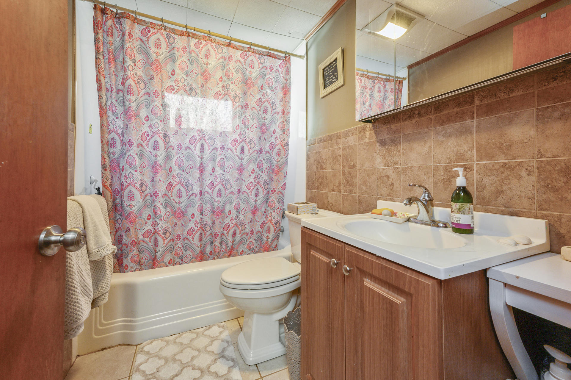 358 Strawberry Hill Road Centerville, MA 02632 - Photo 15 of 25 a bathroom with a sink toilet and shower