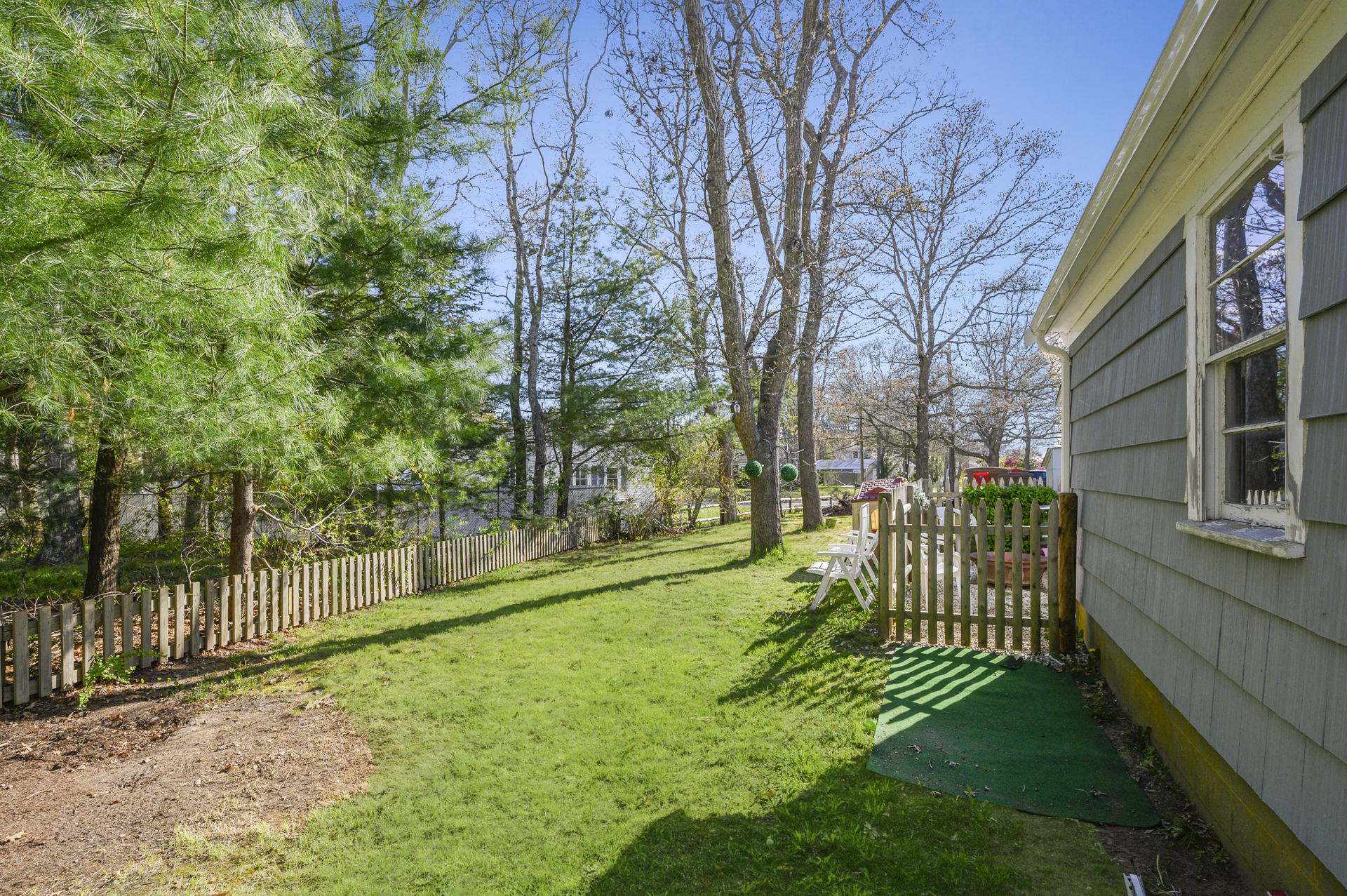 358 Strawberry Hill Road Centerville, MA 02632 - Photo 17 of 25 a view of a park with large trees