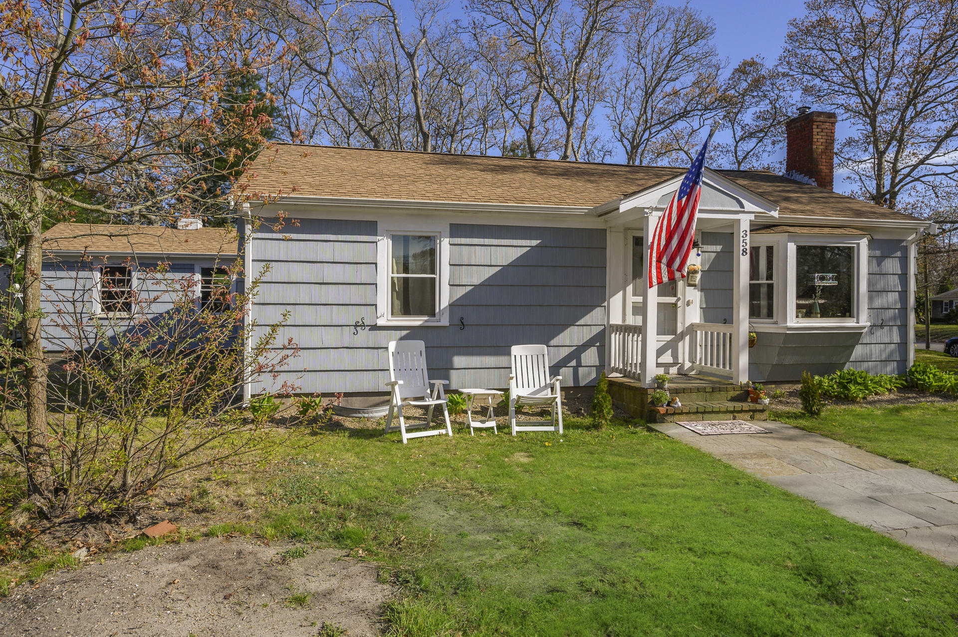 358 Strawberry Hill Road Centerville, MA 02632 - Photo 19 of 25 a view of a house with a yard