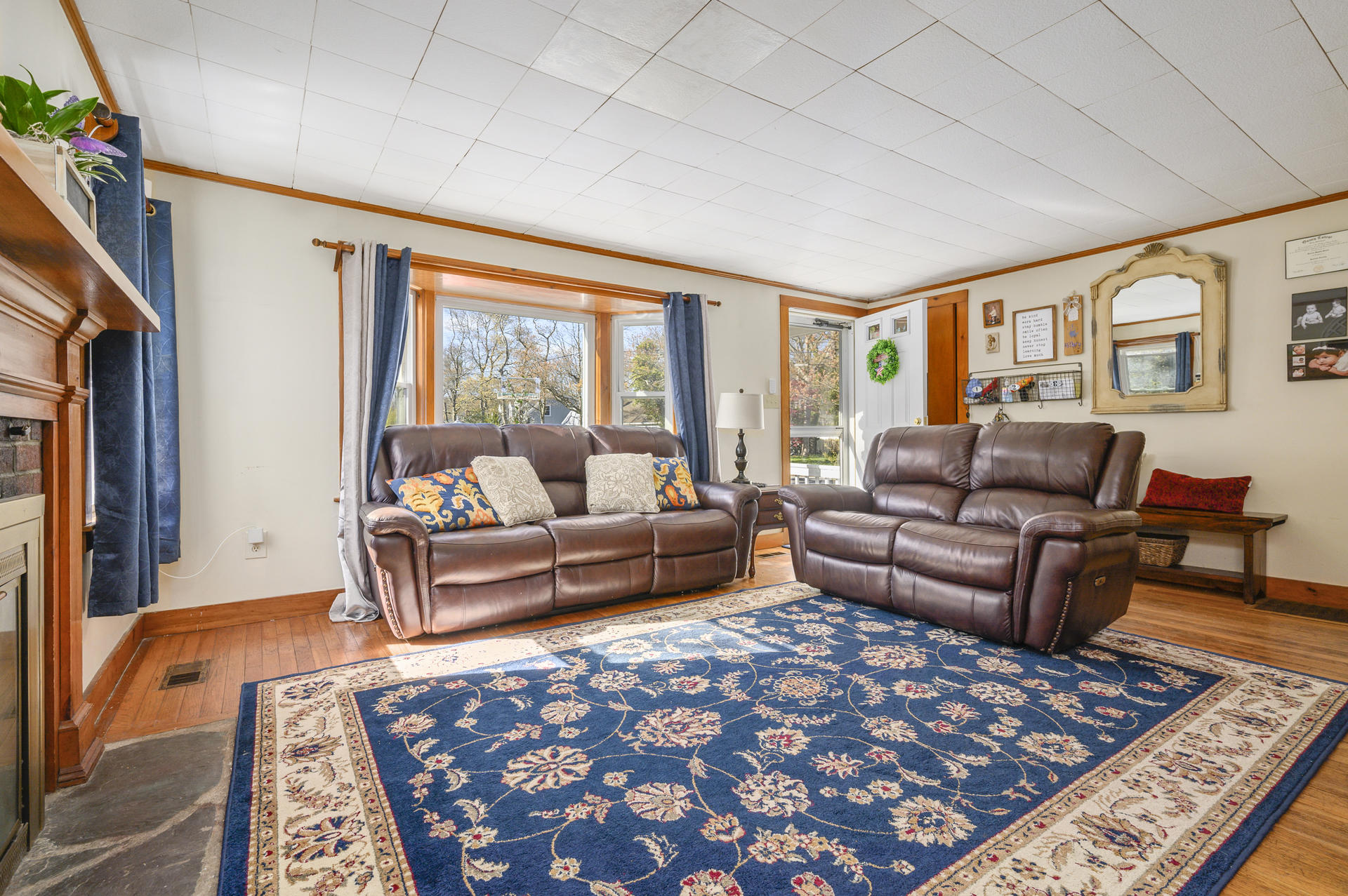 358 Strawberry Hill Road Centerville, MA 02632 - Photo 3 of 25 a living room with furniture and a rug