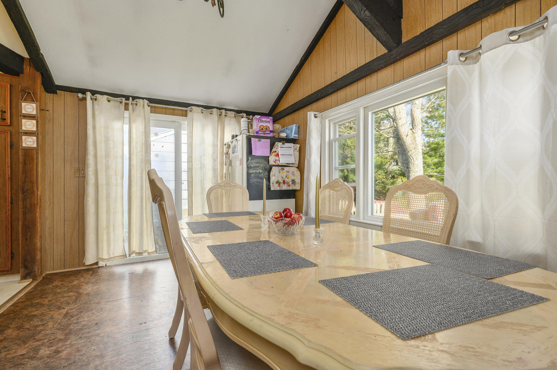 358 Strawberry Hill Road Centerville, MA 02632 - Photo 6 of 25 a view of a dining room with furniture and wooden floor