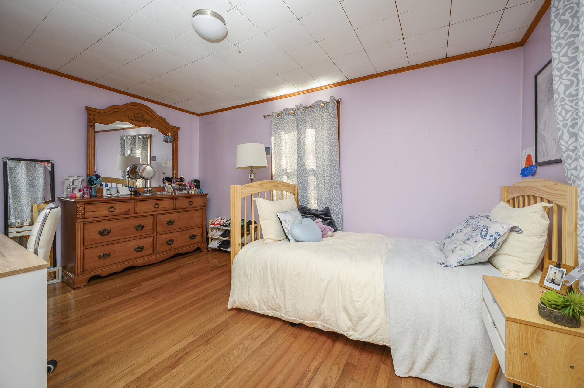358 Strawberry Hill Road Centerville, MA 02632 - Photo 10 of 25 a bedroom with a bed and a dresser