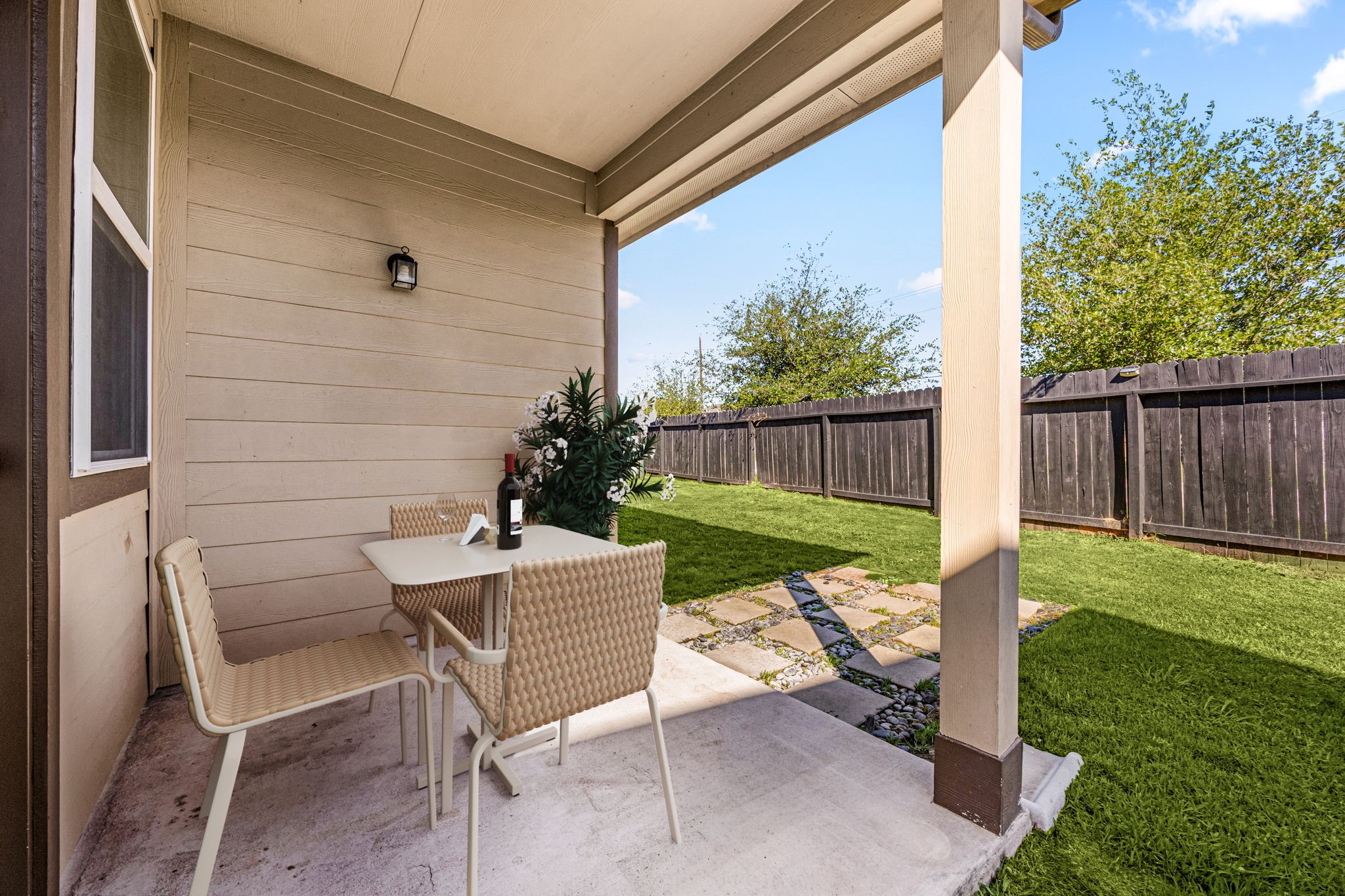 18606 Lansdowne Stream Path Katy, TX 77449 - Photo 10 of 39 a view of a chair and table in backyard of the house