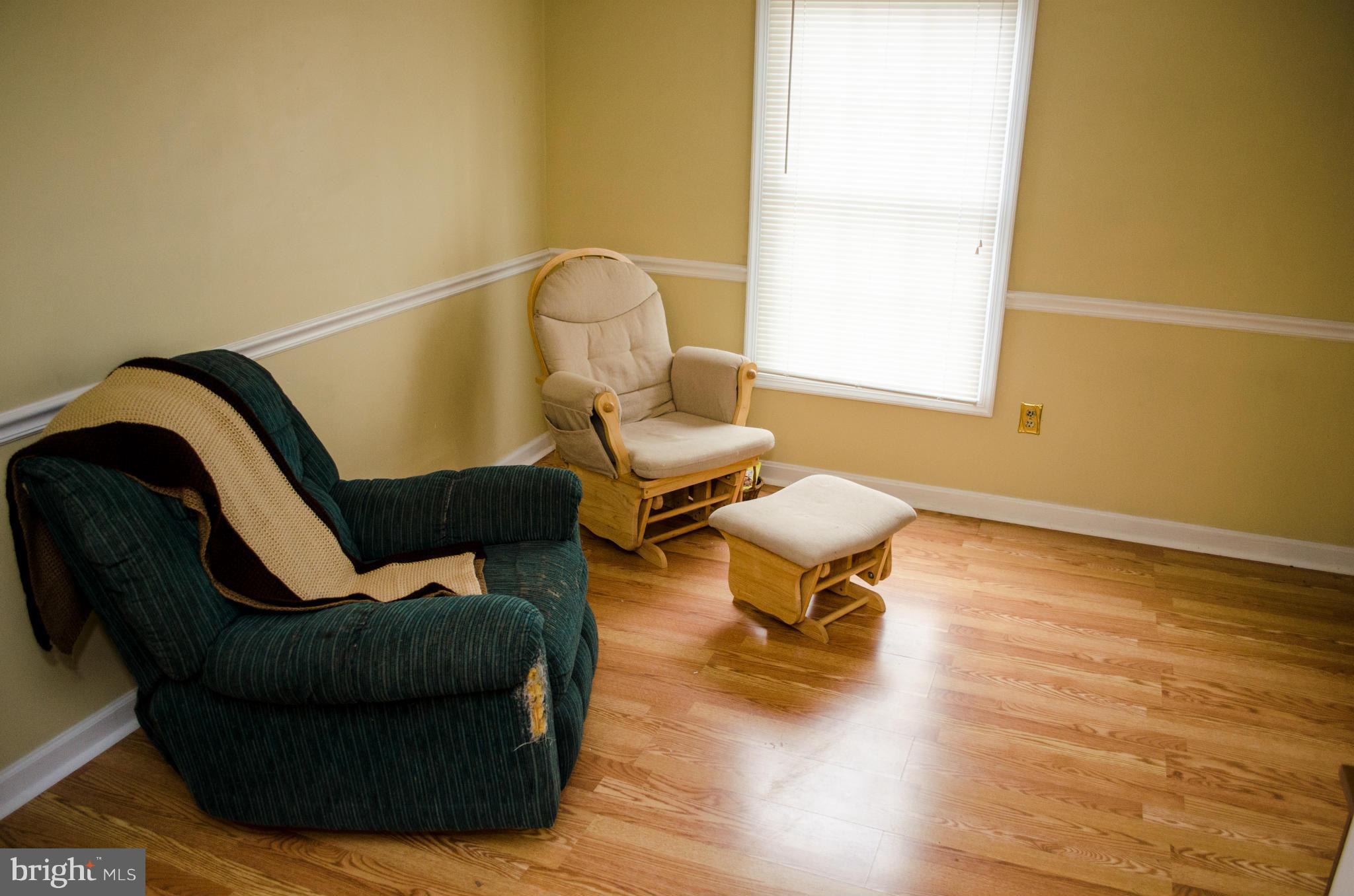 305 Algers Avenue Ranson, WV 25438 - Photo 14 of 30 a living room with furniture and a wooden floor