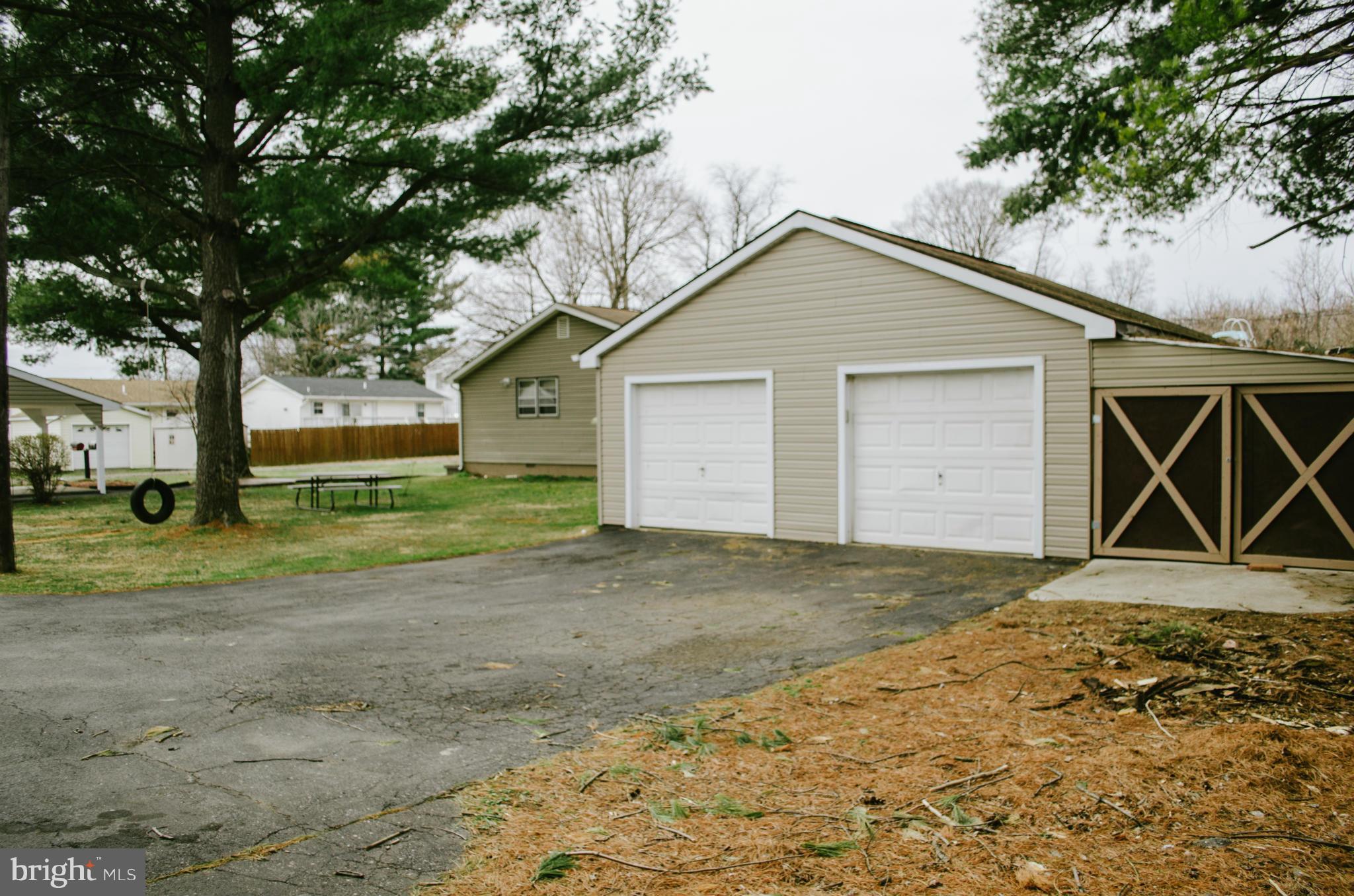 305 Algers Avenue Ranson, WV 25438 - Photo 3 of 30 a view of outdoor space yard and garage