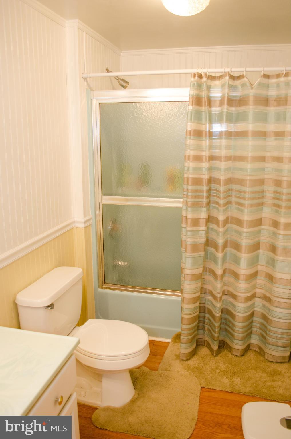 305 Algers Avenue Ranson, WV 25438 - Photo 21 of 30 a bathroom with a toilet and a shower