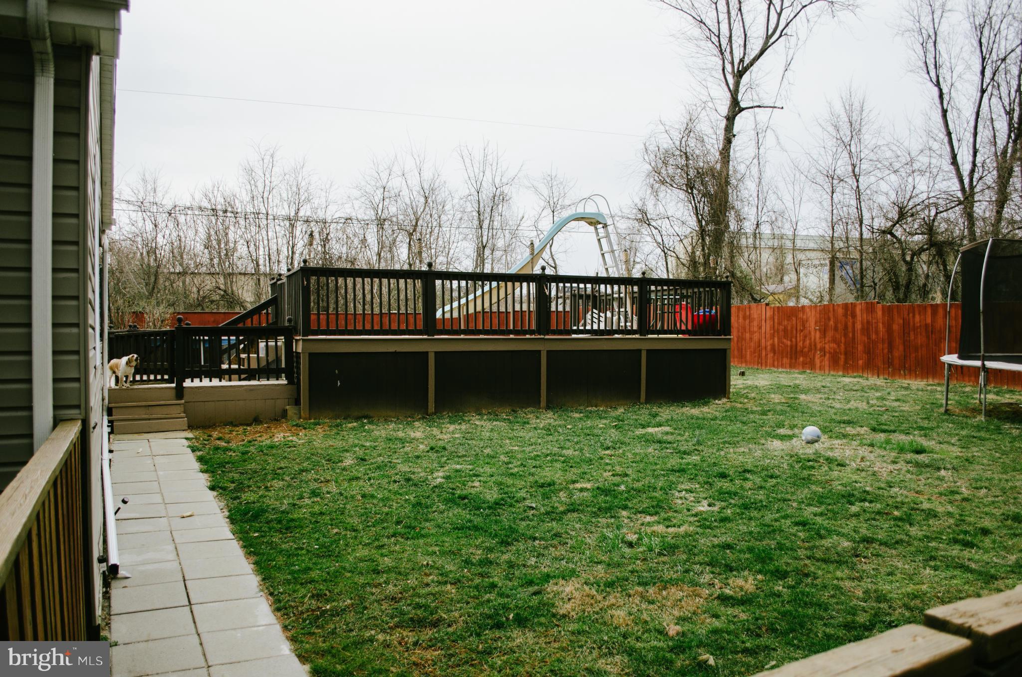 305 Algers Avenue Ranson, WV 25438 - Photo 4 of 30 a view of a backyard with sitting area