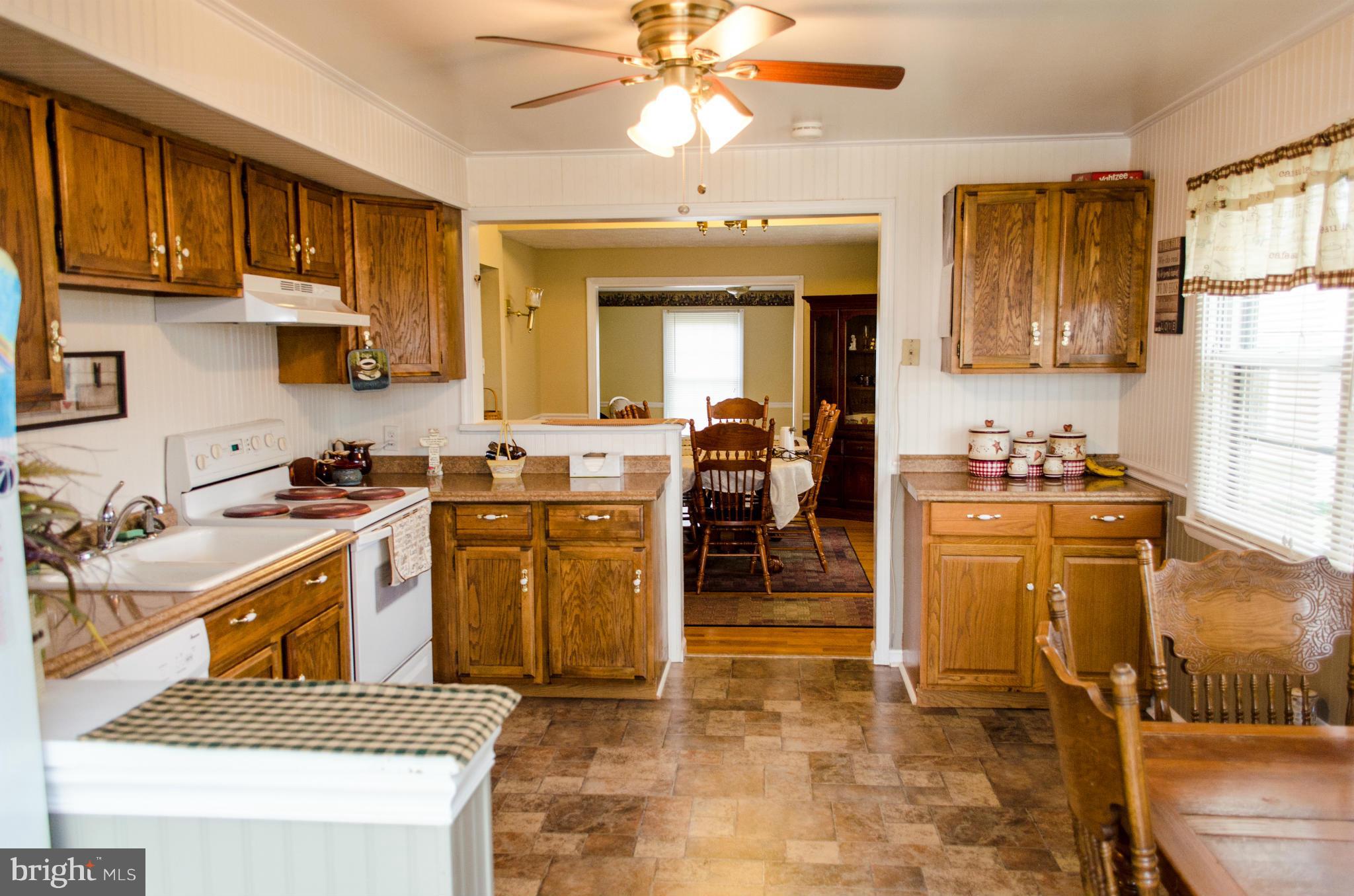 305 Algers Avenue Ranson, WV 25438 - Photo 8 of 30 a kitchen with a sink appliances and cabinets