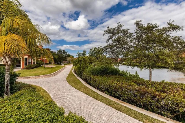 a view of a garden with a lounge chair