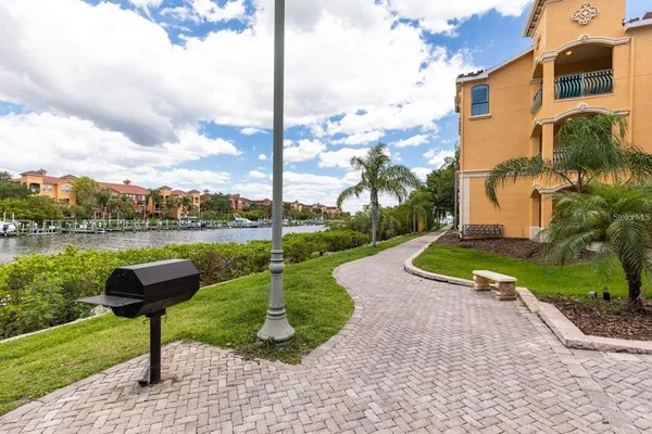 a view of a lake with a yard