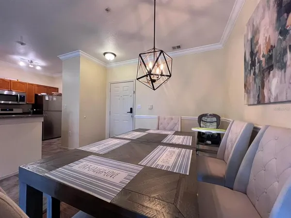 a view of a livingroom with furniture and wooden floor