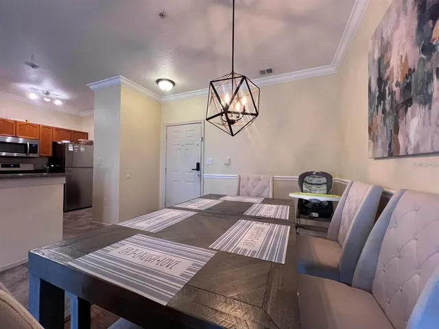 a view of a livingroom with furniture and wooden floor