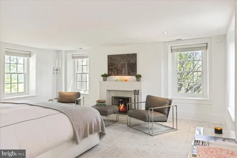 a bed room with a bed and a couch