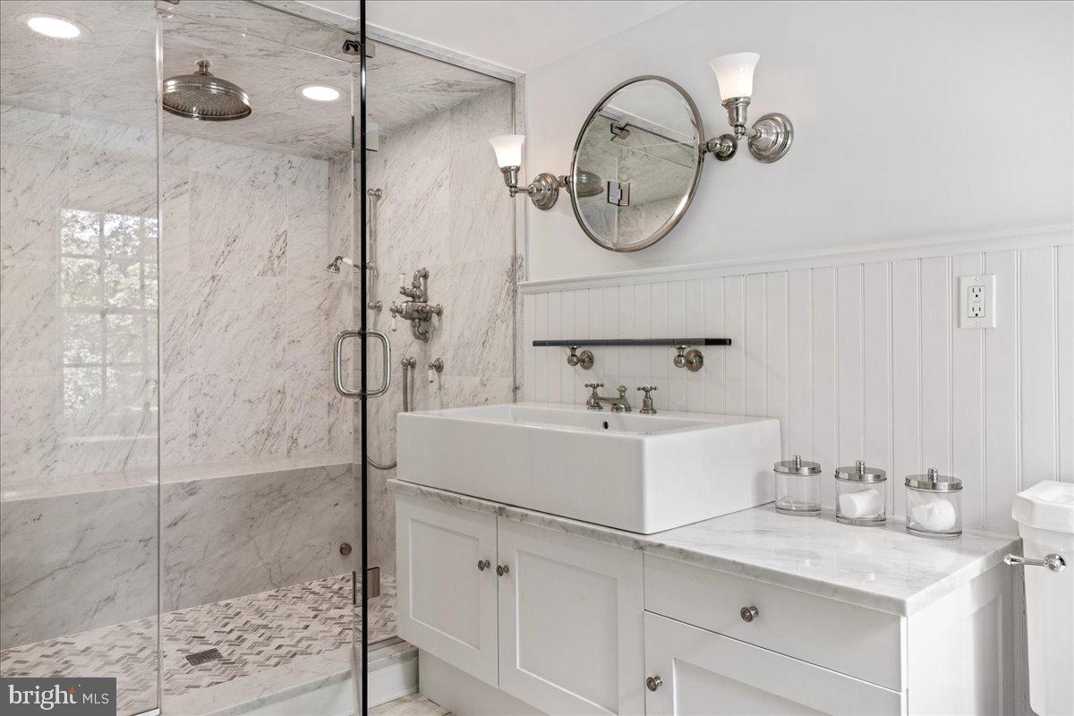5966 Mechanicsville Road Doylestown, PA 18902 - Photo 15 of 89 a bathroom with a sink and a mirror