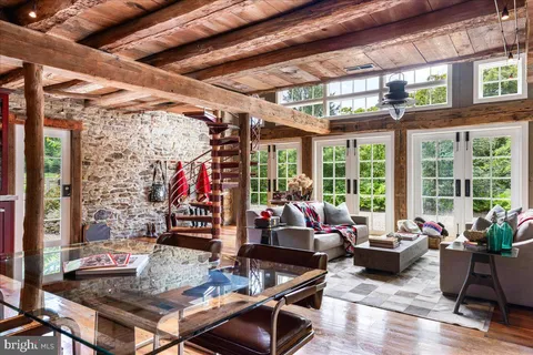 a kitchen with stainless steel appliances granite countertop a stove and a refrigerator