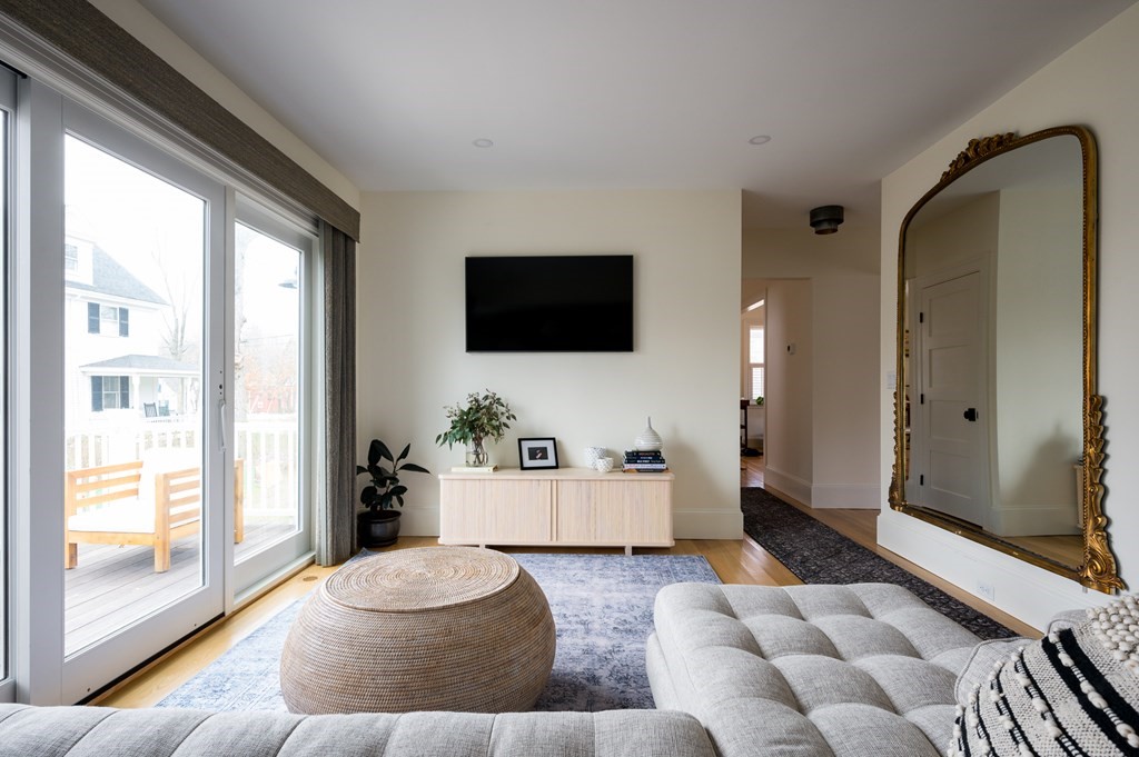 460 Main Street Hingham, MA 02043 - Photo 11 of 42 a living room with furniture and a flat screen tv