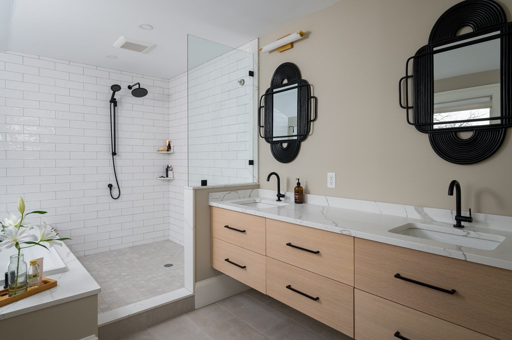 460 Main Street Hingham, MA 02043 - Photo 27 of 42 a bathroom with a double vanity sink mirror and bathtub