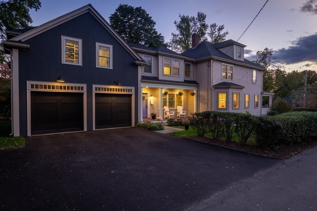 460 Main Street Hingham, MA 02043 - Photo 3 of 42 a front view of a house with a yard and garage