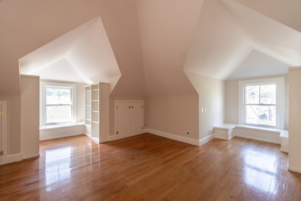 460 Main Street Hingham, MA 02043 - Photo 33 of 42 an empty room with wooden floor and windows