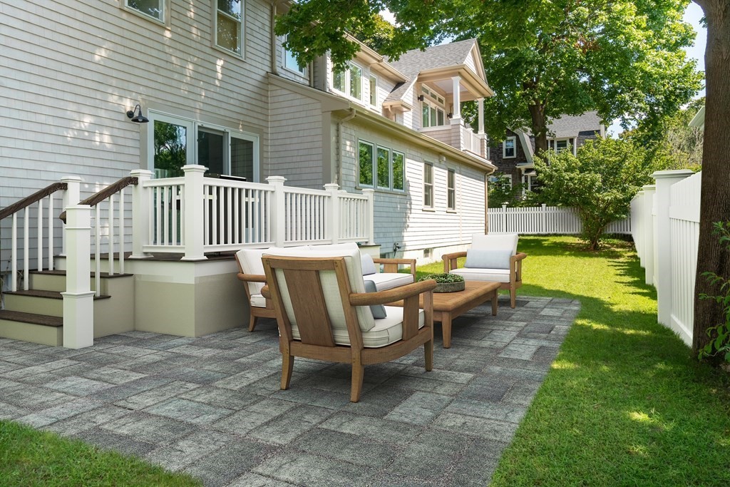 460 Main Street Hingham, MA 02043 - Photo 42 of 42 a view of a chair and table in backyard