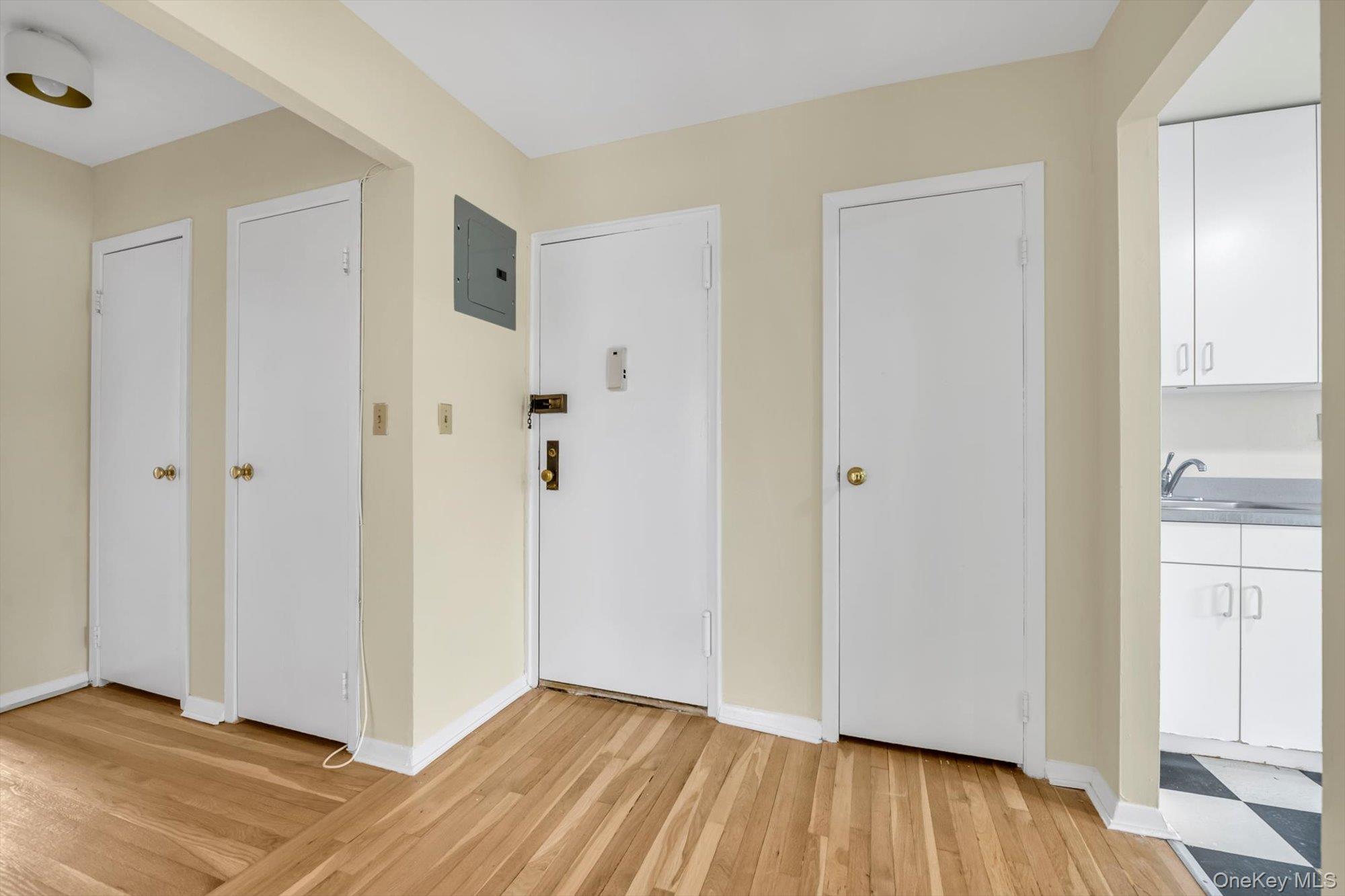 643 Pelham Road, Unit 6D New Rochelle, NY 10805 - Photo 2 of 12 a view of an empty room with closet and wooden floor