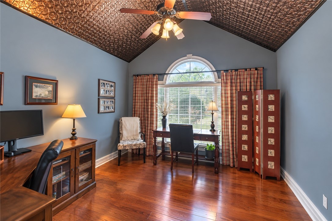 114 Augusta National Anderson, SC 29621 - Photo 20 of 44 Gleaming hardwood floors and a vaulted pressed-tin ceiling define this elegant home office space.