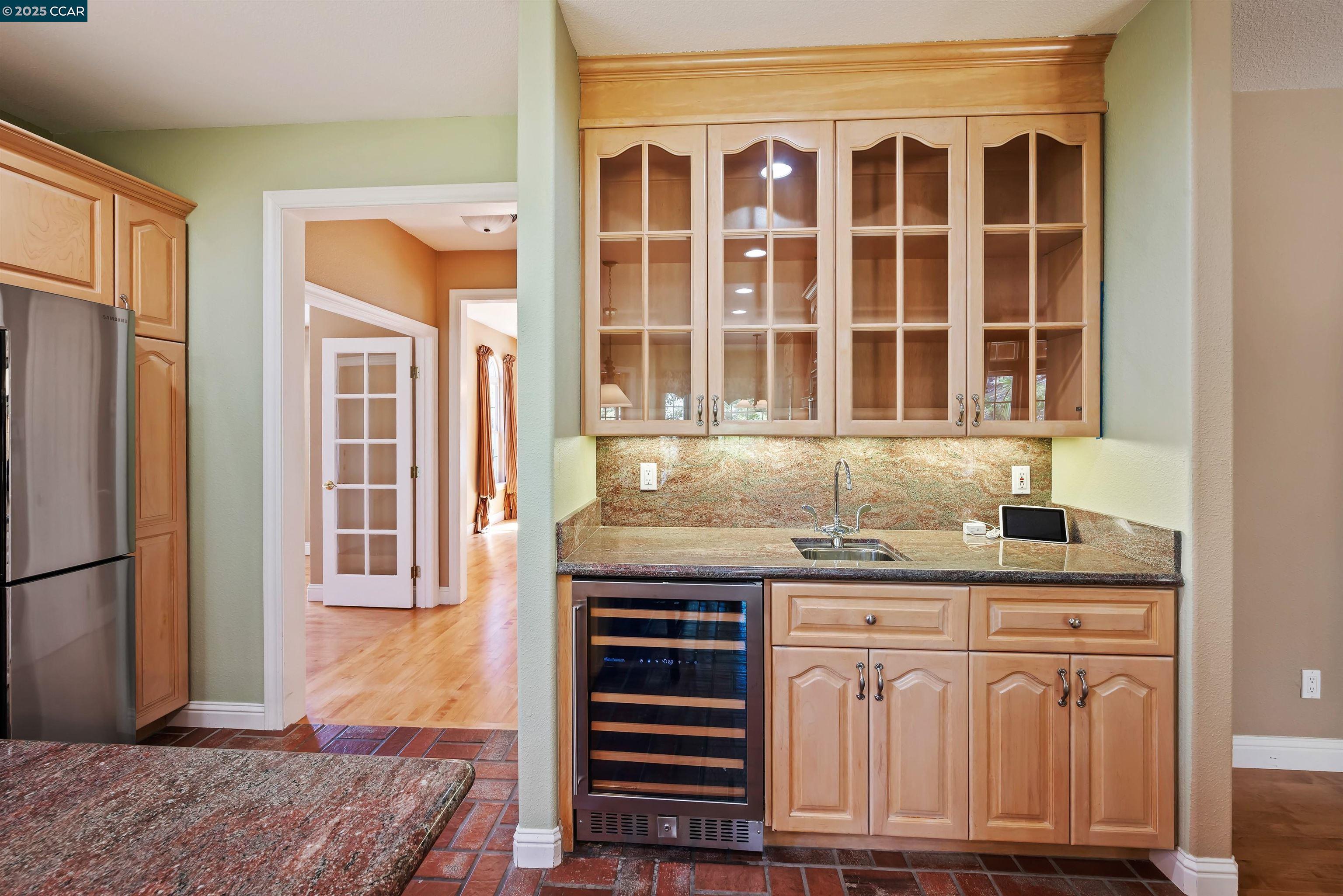 20 Oak Crest Lane Alamo, CA 94507 - Photo 12 of 41 a kitchen with granite countertop a sink and cabinets