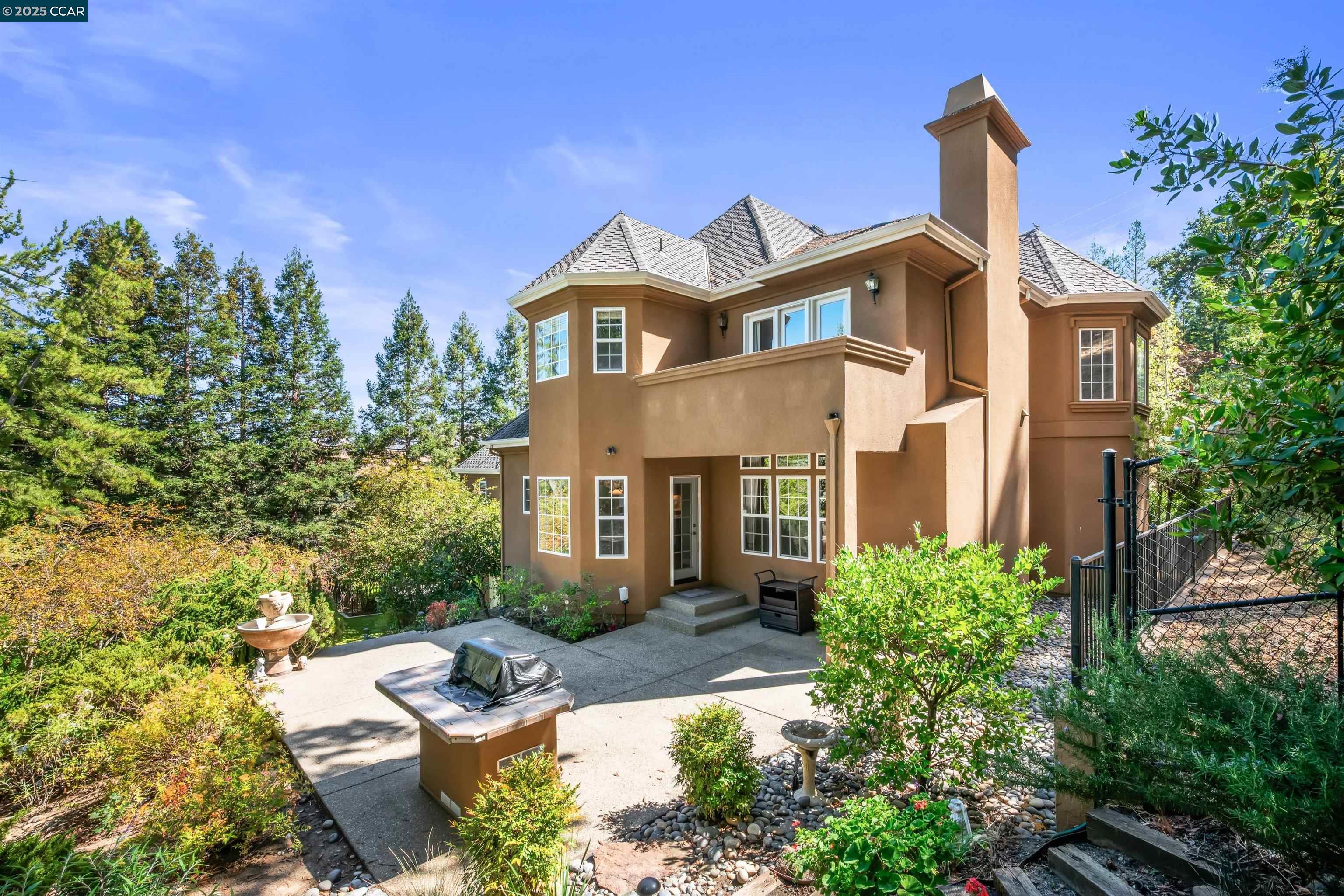 20 Oak Crest Lane Alamo, CA 94507 - Photo 35 of 41 a front view of a house with garden