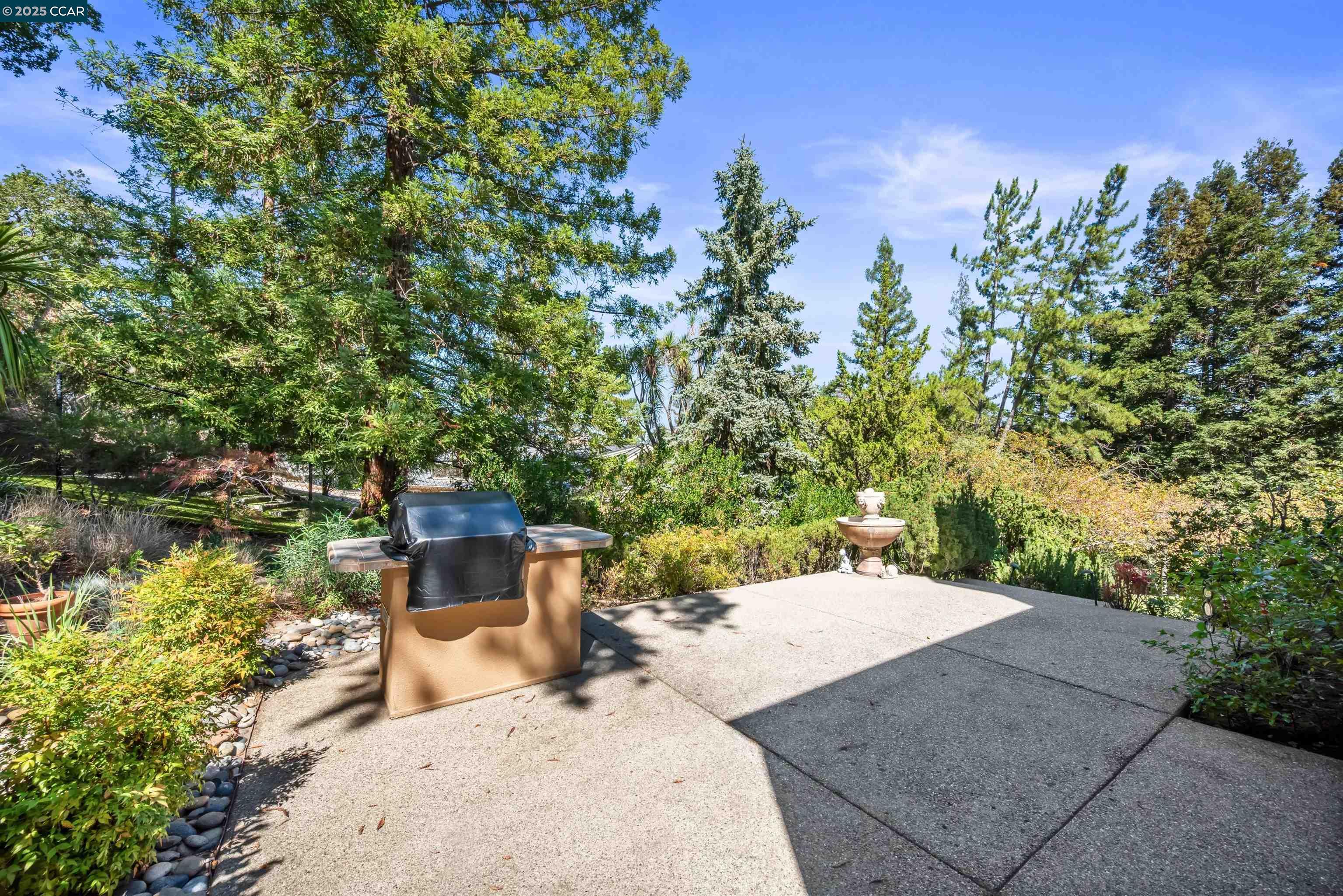 20 Oak Crest Lane Alamo, CA 94507 - Photo 36 of 41 a view of a backyard with sitting area