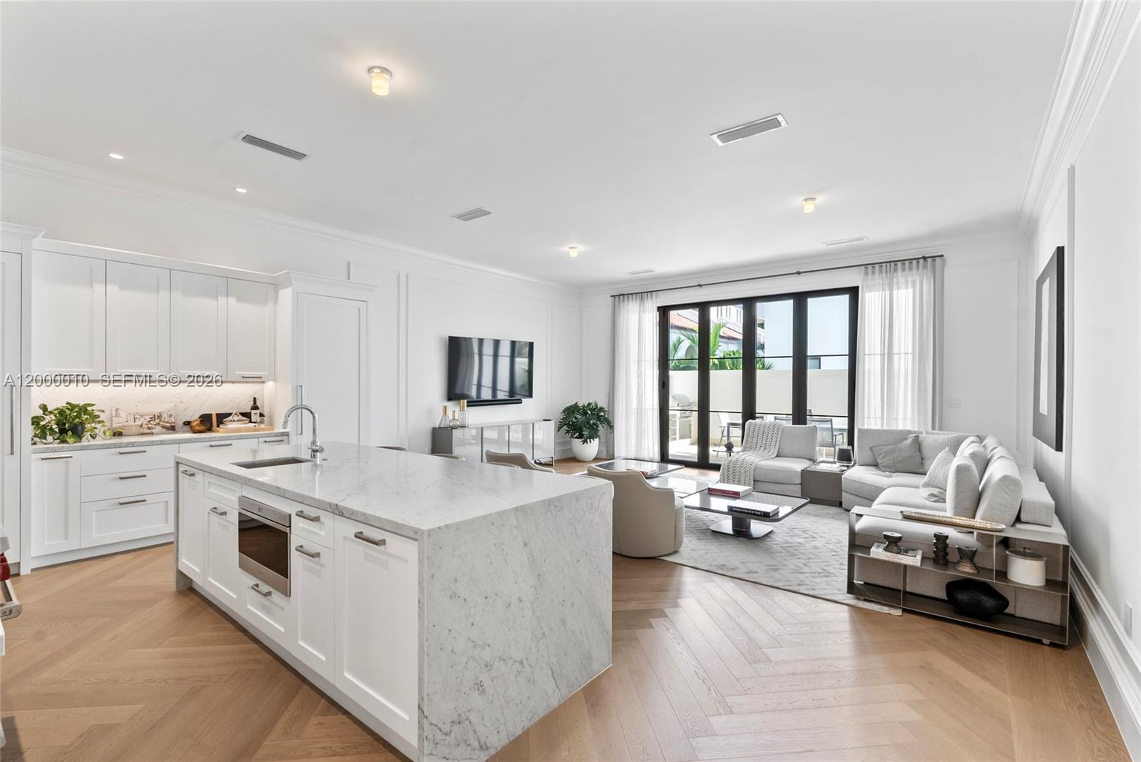 2617 Anderson Road Coral Gables, FL 33134 - Photo 14 of 49 a large white room with a large window and white couch