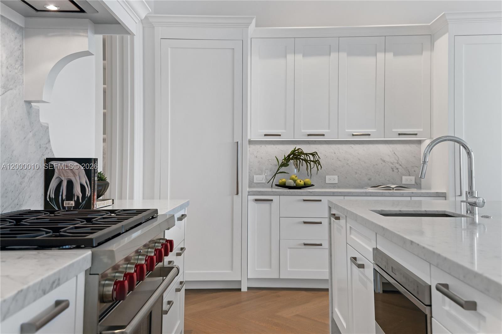 2617 Anderson Road Coral Gables, FL 33134 - Photo 21 of 49 a kitchen with white cabinets and appliances
