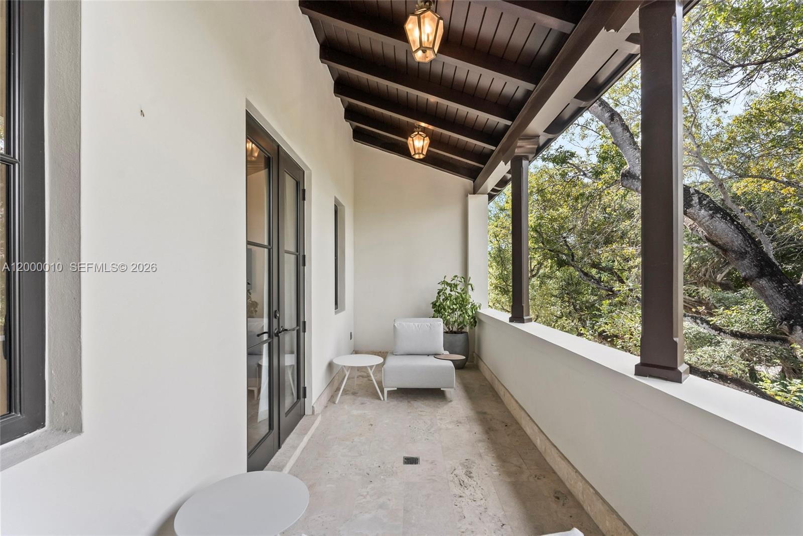 2617 Anderson Road Coral Gables, FL 33134 - Photo 39 of 49 a living room with furniture and a large window