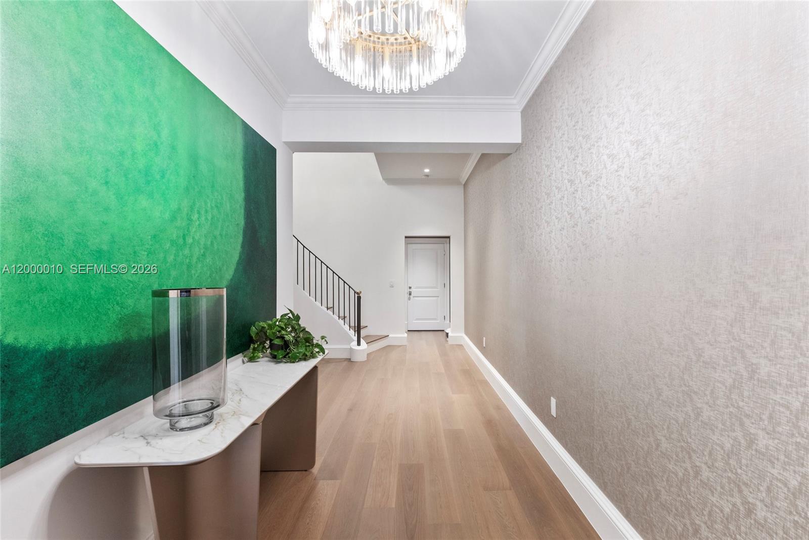 2617 Anderson Road Coral Gables, FL 33134 - Photo 4 of 49 a view of a hallway with windows