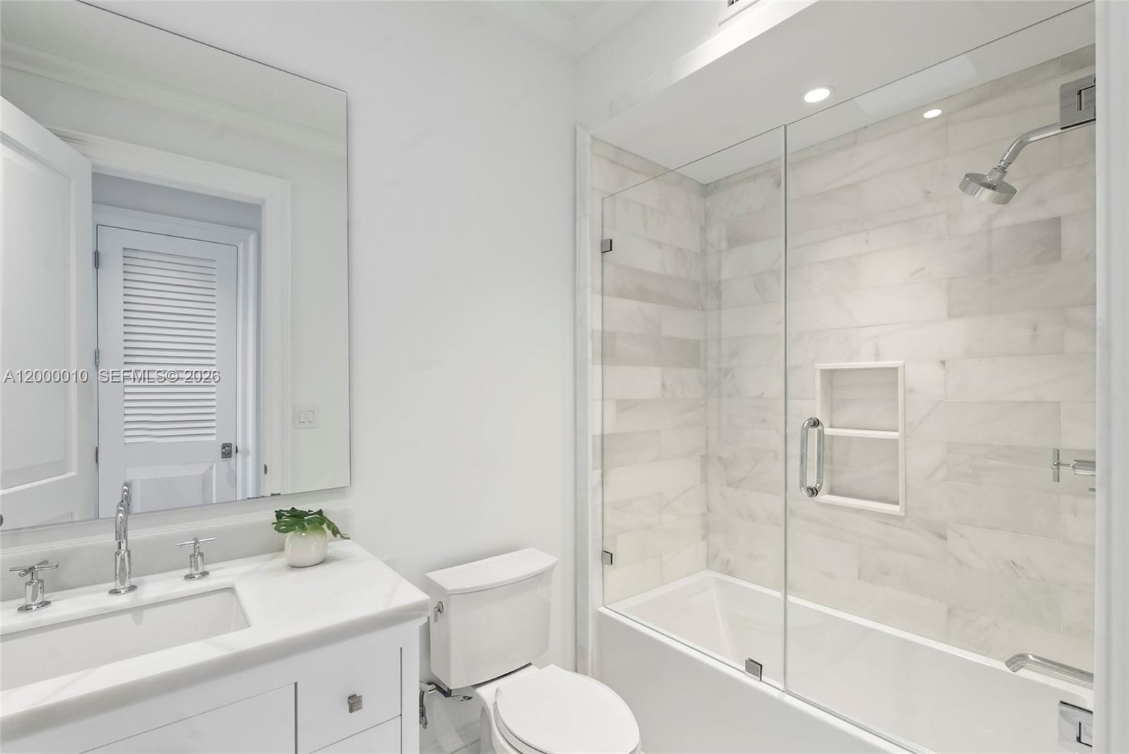 2617 Anderson Road Coral Gables, FL 33134 - Photo 45 of 49 a bathroom with a sink toilet and shower