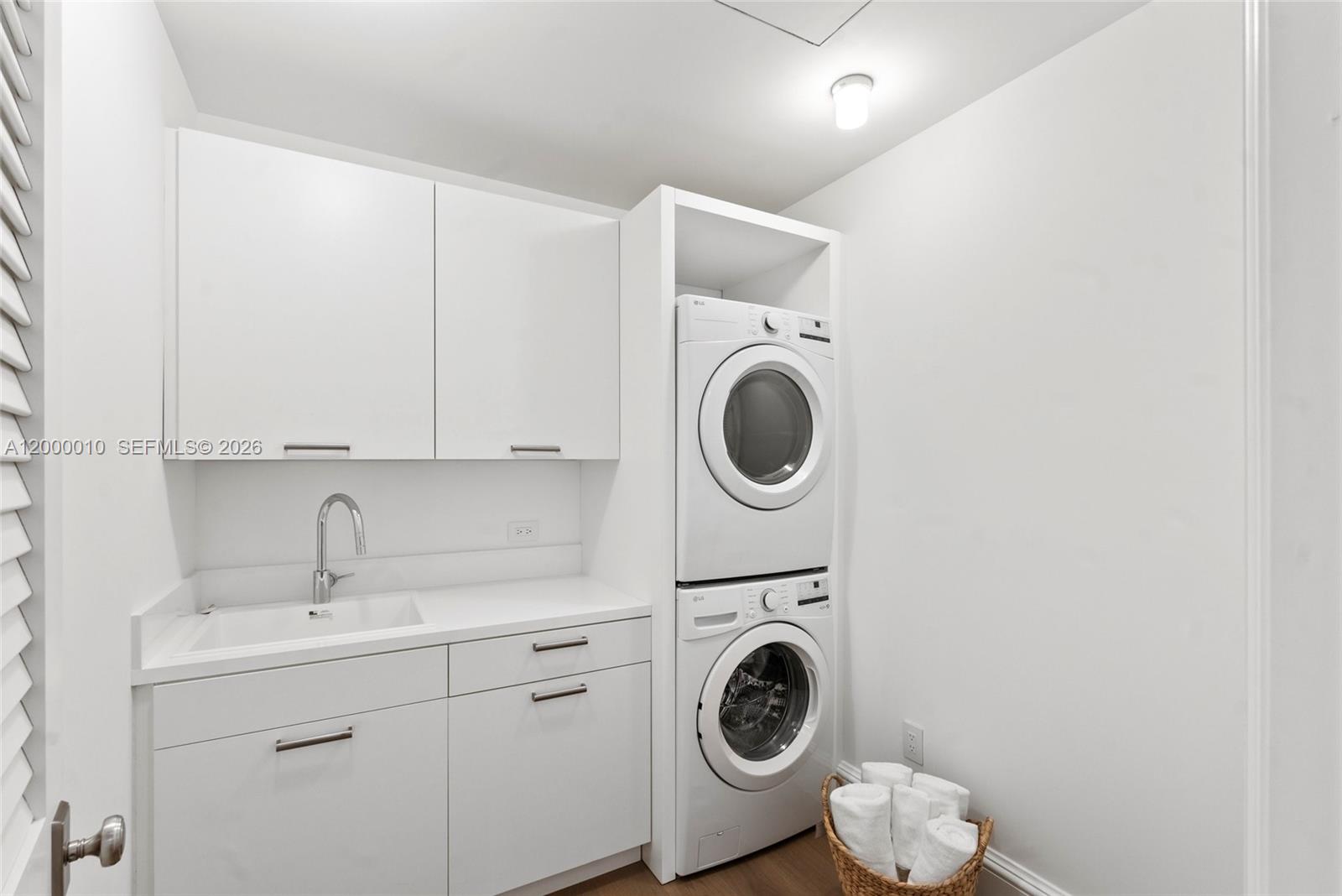 2617 Anderson Road Coral Gables, FL 33134 - Photo 9 of 49 a utility room with dryer and washer