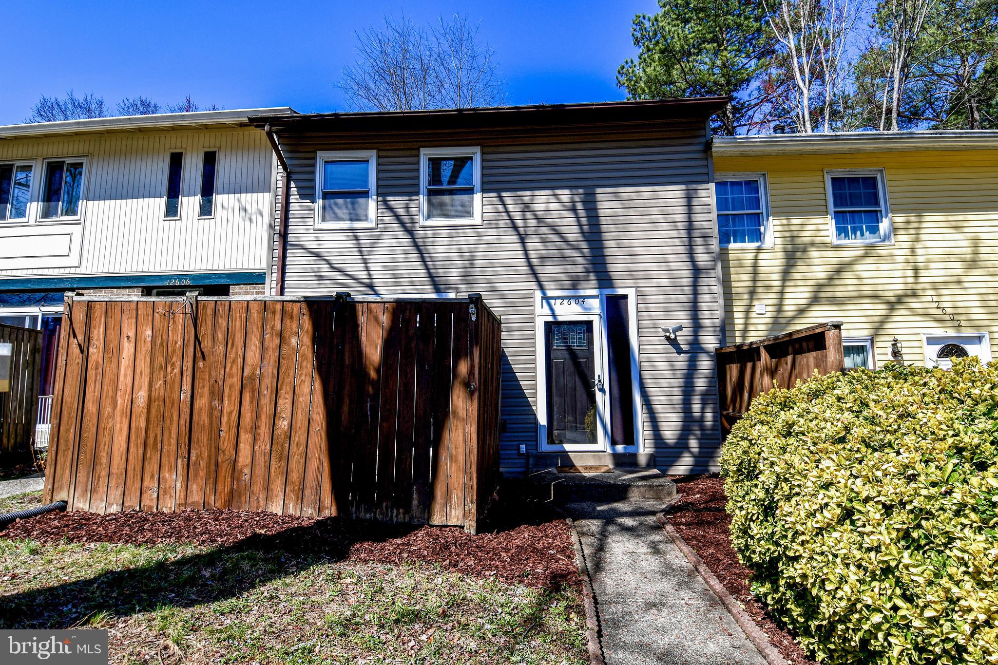 12604 Dulcinea Place Woodbridge, VA 22192 - Photo 2 of 63 a front view of a house