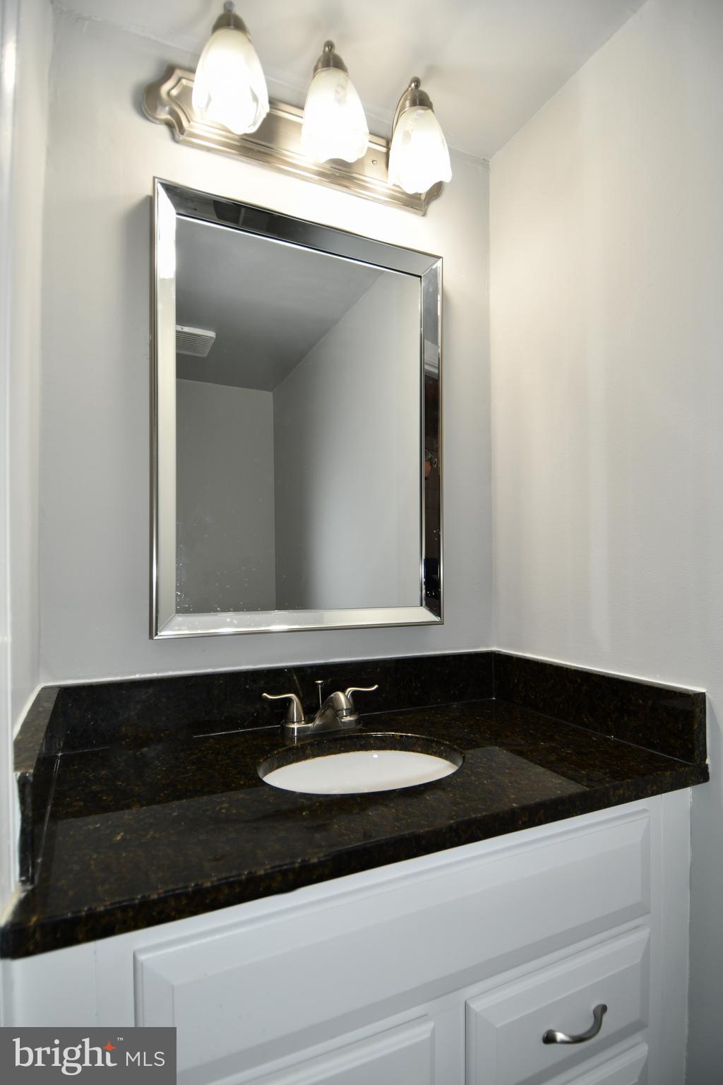 12604 Dulcinea Place Woodbridge, VA 22192 - Photo 28 of 63 Half Bathroom on Main Level