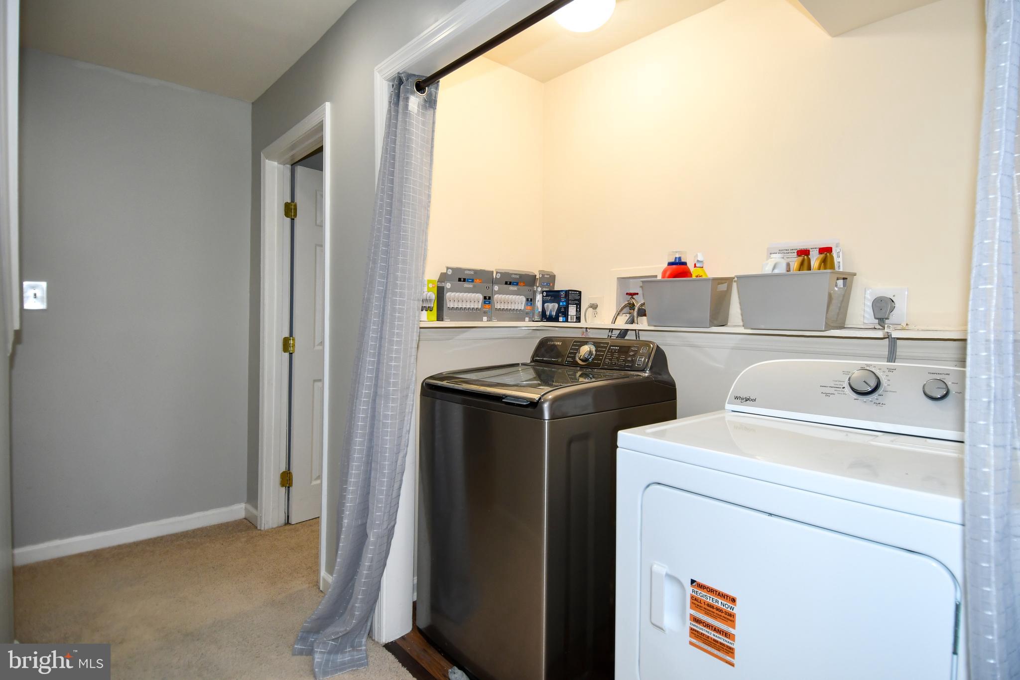 12604 Dulcinea Place Woodbridge, VA 22192 - Photo 38 of 63 a utility room with dryer and washer