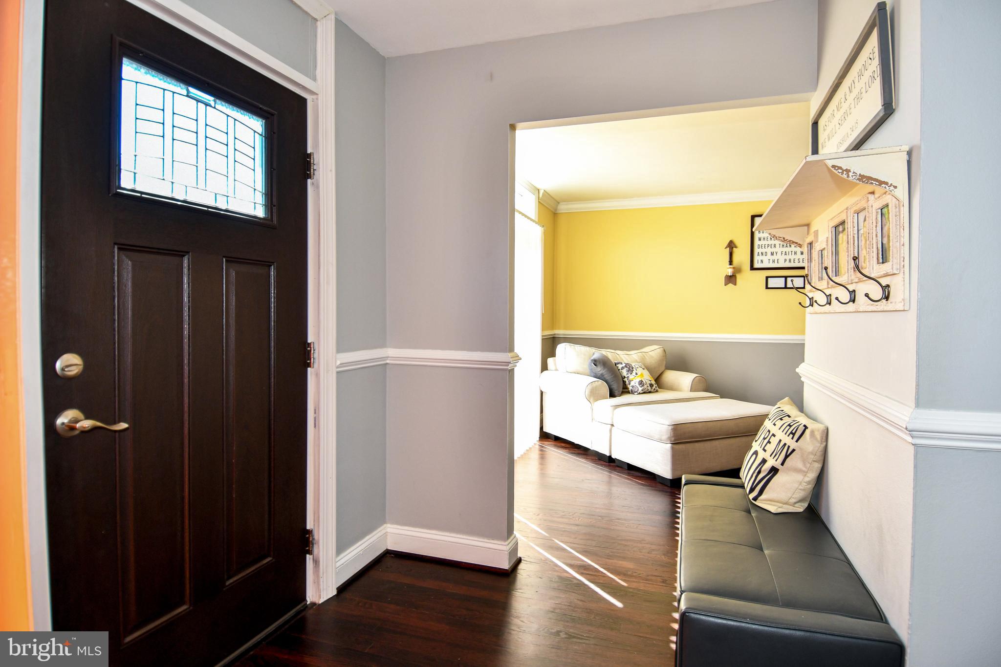12604 Dulcinea Place Woodbridge, VA 22192 - Photo 4 of 63 a living room with furniture and a window