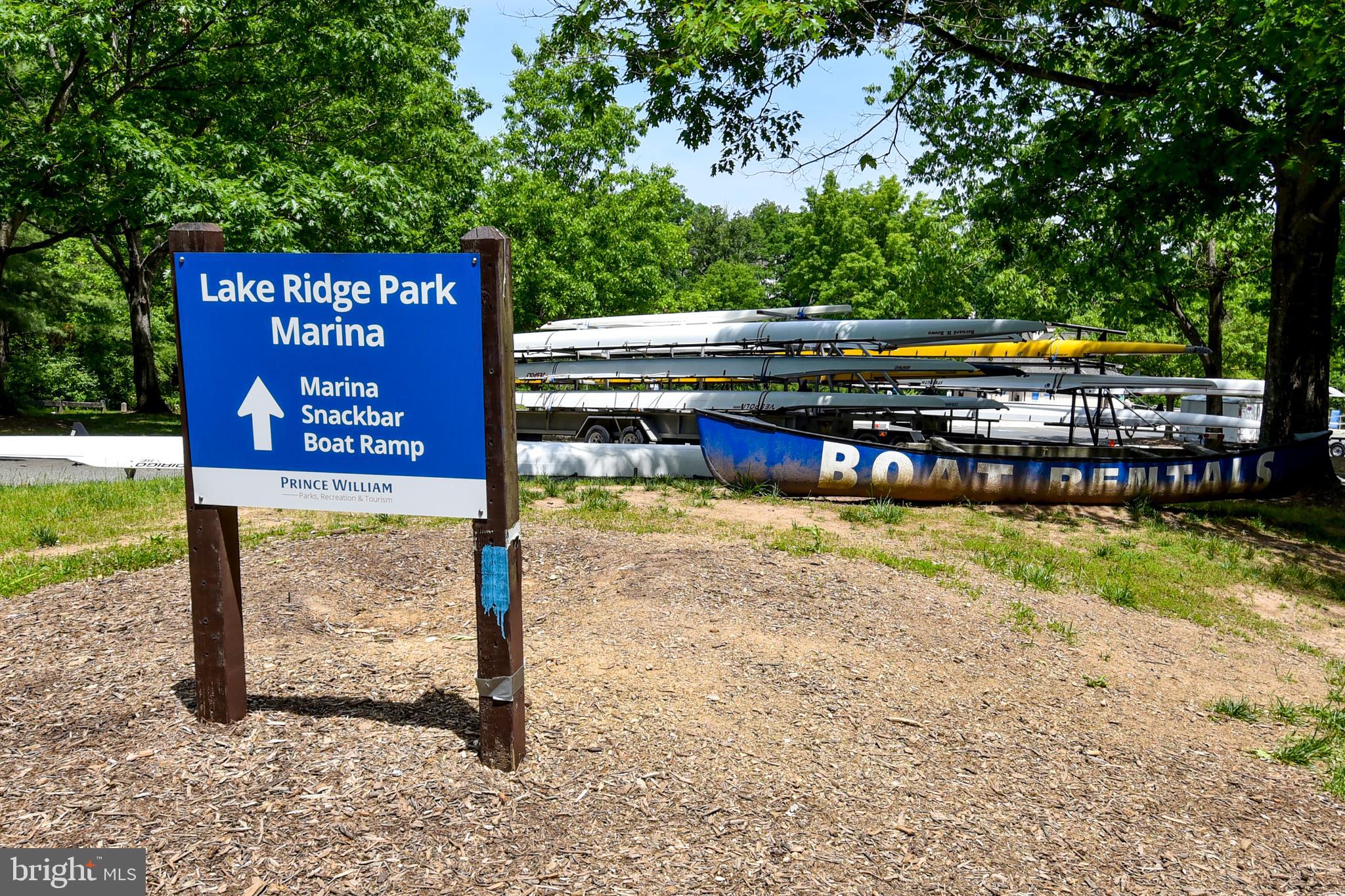 12604 Dulcinea Place Woodbridge, VA 22192 - Photo 60 of 63 a sign that is sitting on a brick wall