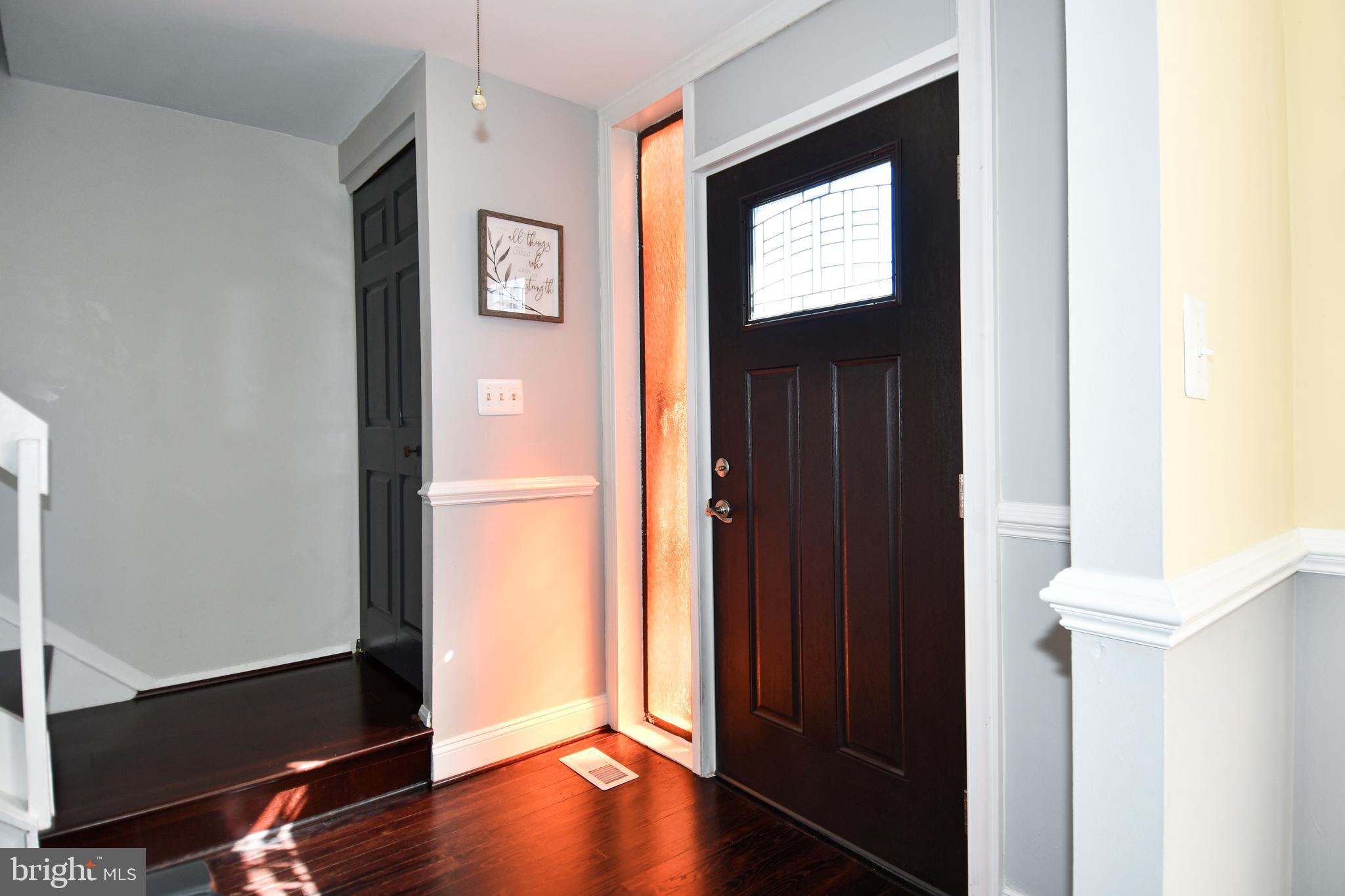 12604 Dulcinea Place Woodbridge, VA 22192 - Photo 7 of 63 a view of an entryway door with wooden floor