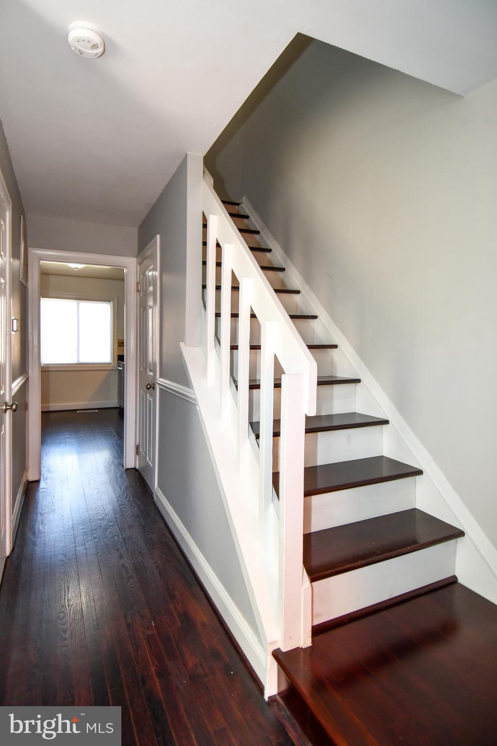 12604 Dulcinea Place Woodbridge, VA 22192 - Photo 10 of 63 a view of entryway and hall with wooden floor