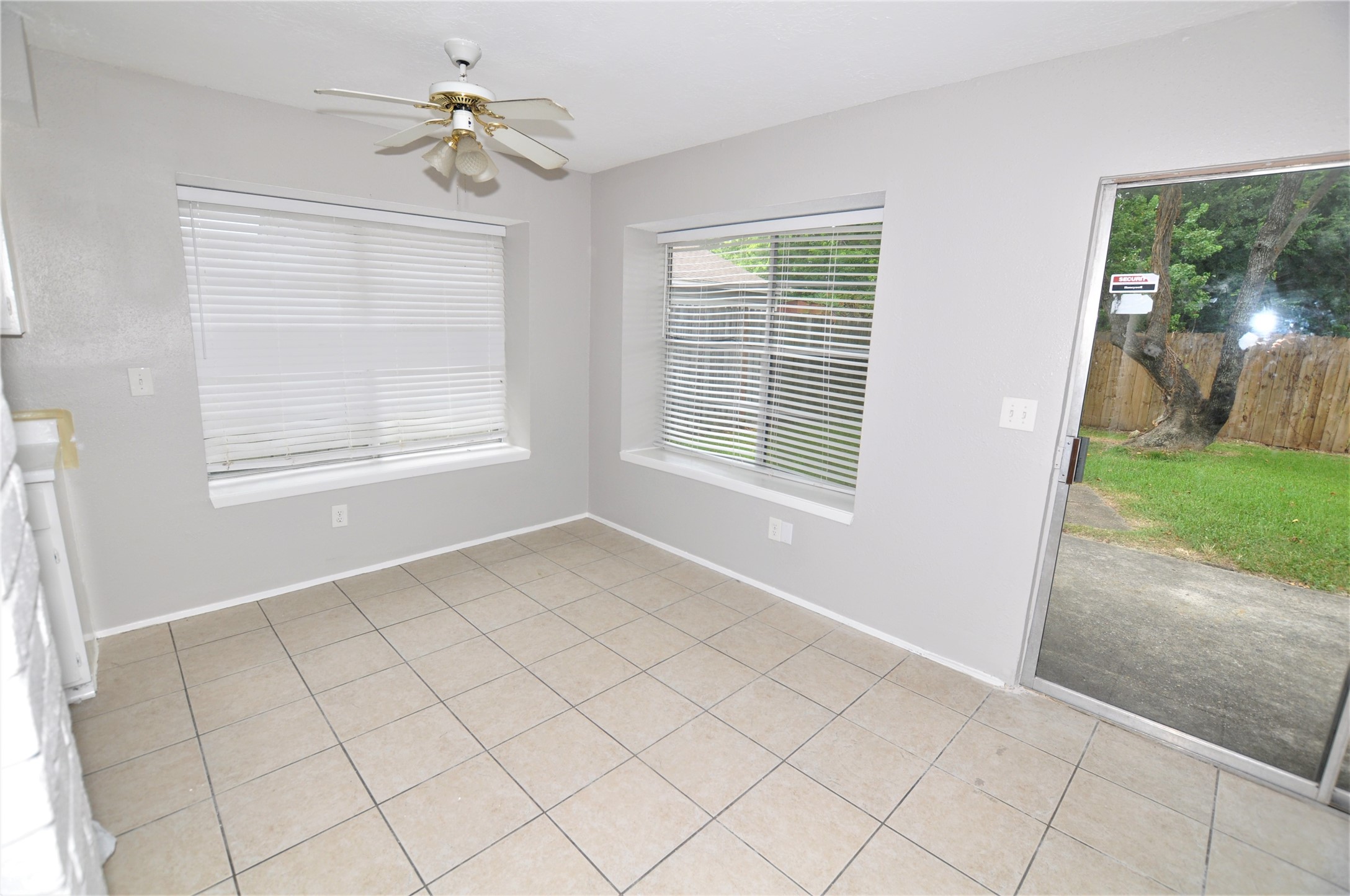 5446 Quail Tree Lane Humble, TX 77346 - Photo 6 of 12 a view of an empty room with a window
