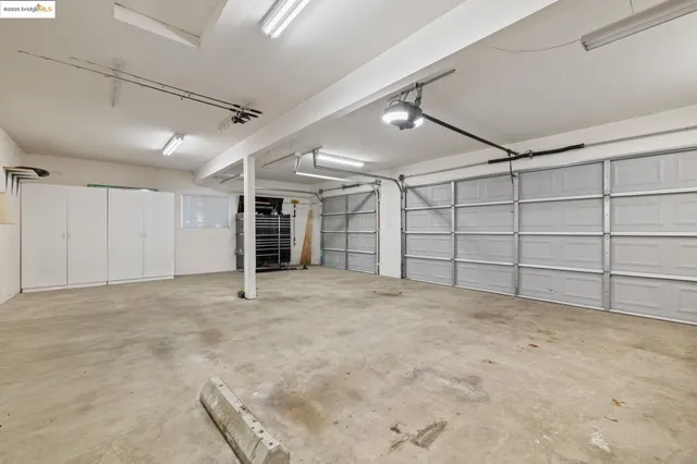 a view of balcony with wooden floor and fence