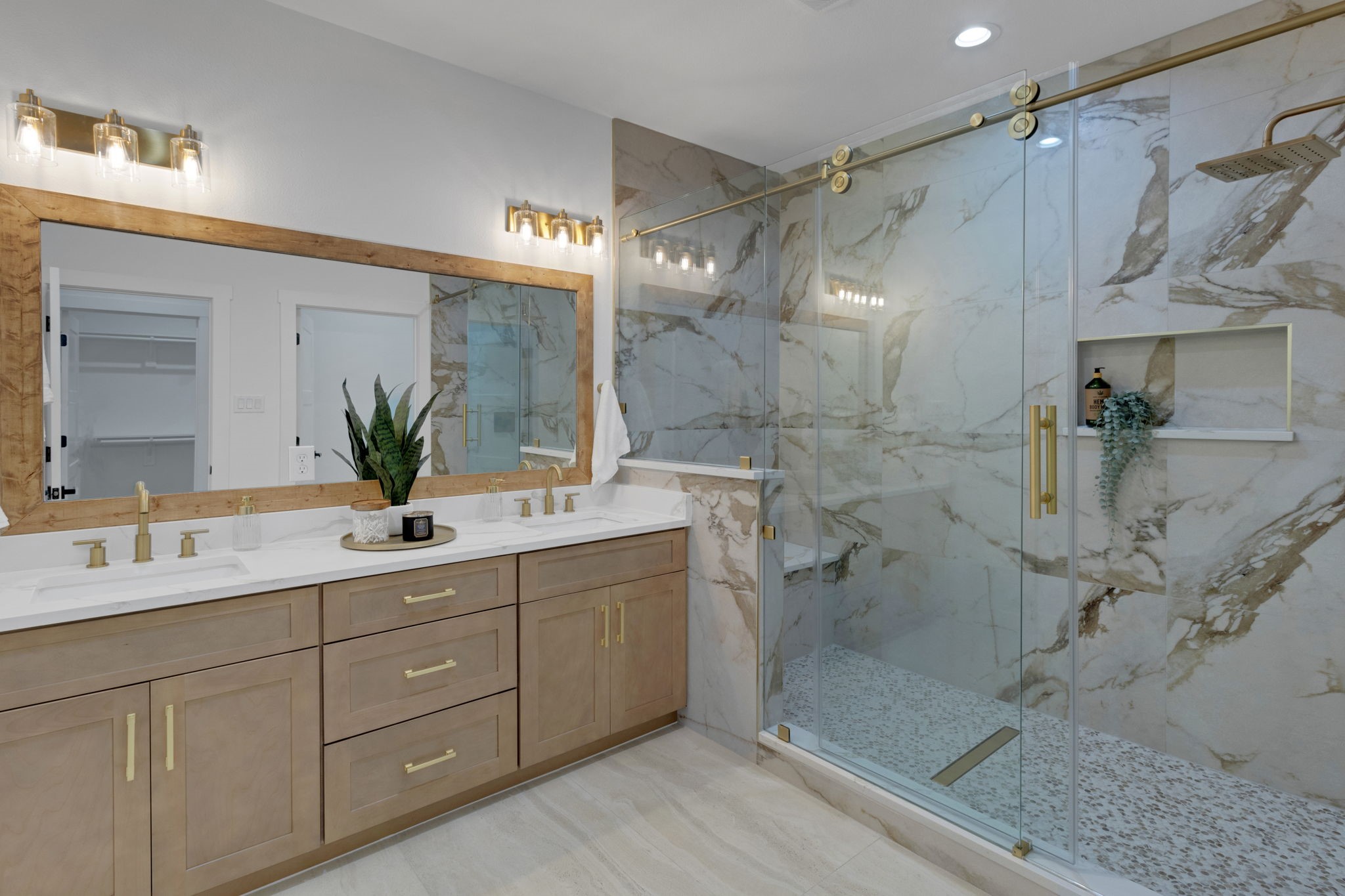 4202 Plaag Street Houston, TX 77016 - Photo 25 of 38 Elegant primary bath featuring a spacious shower, dual sinks, and premium finishes.