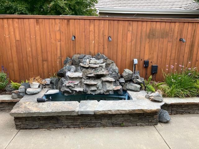 2157 West Rue St Michel Fresno, CA 93711 - Photo 21 of 22 a view of a fireplace with sitting area