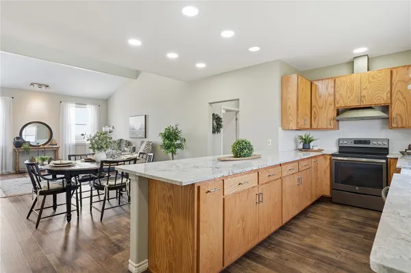 a kitchen with counter space cabinets and appliances