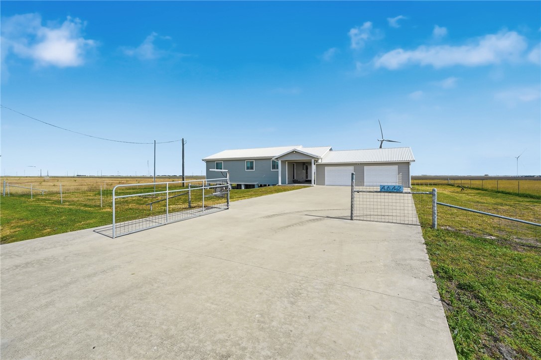 4642 Lackey Taft, TX 78390 - Photo 4 of 40 a view of a terrace with a table and chairs